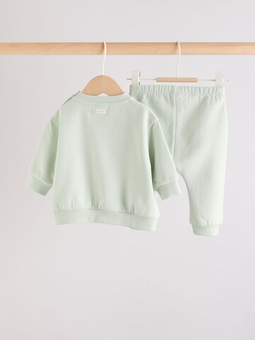 Next Juoksupuku värissä vihreä