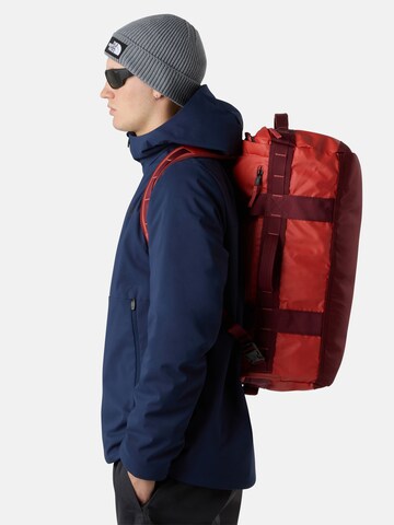Geantă de călătorie 'Base Camp Voyager' de la THE NORTH FACE pe roșu