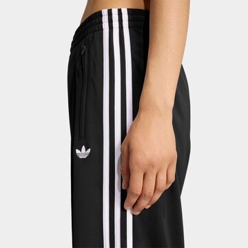 Wide leg Pantaloni di ADIDAS ORIGINALS in nero