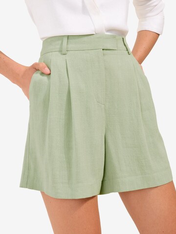 Wide leg Pantaloni con pieghe di Friends Like These in verde: frontale