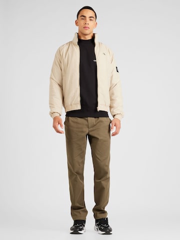 Calvin Klein Jeans Φθινοπωρινό και ανοιξιάτικο μπουφάν 'HARRINGTON' σε μπεζ