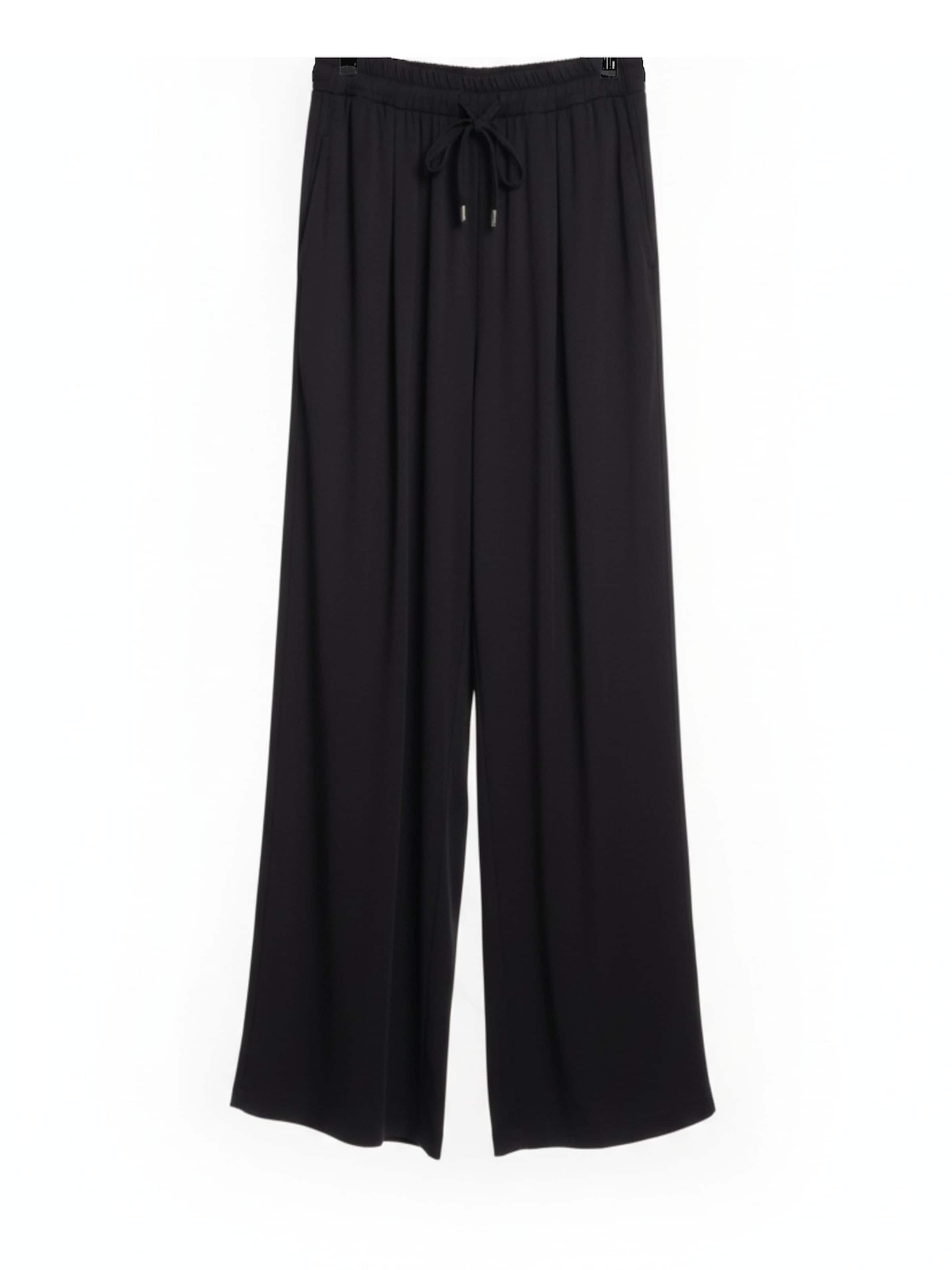 WEARABLE STORIES - Loosefit Pantalón 'Ellie' en negro: frente
