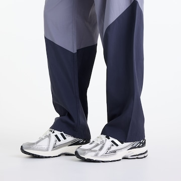 Loosefit Pantaloni 'Sport Legacy Pant' di new balance in grigio