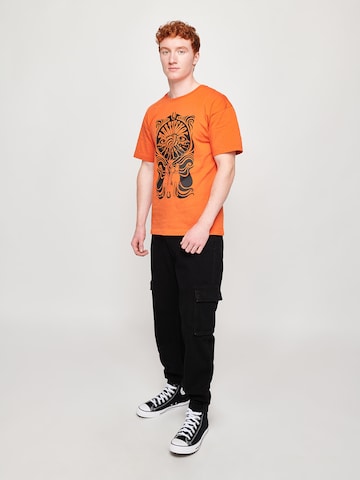 ABOUT YOU x StayKid Shirt 'BIBI+TINA' in Orange