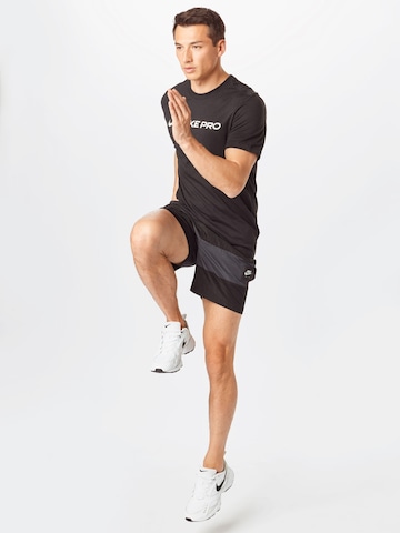 Loosefit Pantalon 'Air' Nike Sportswear en gris