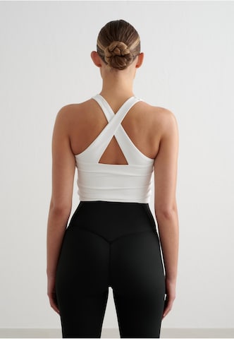 Bustino Reggiseno sportivo 'Essential' di Aim'n in bianco