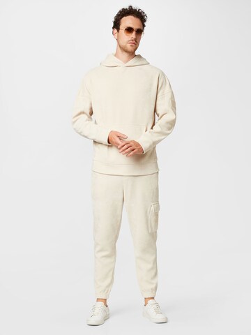 Calvin Klein Jeans Collegepaita värissä beige