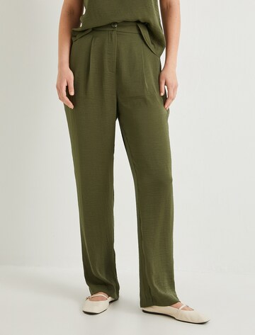 Koton Loose fit Pleat-front trousers in Green: front