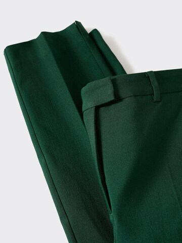 Skinny Pantaloni 'COLA' de la MANGO pe verde