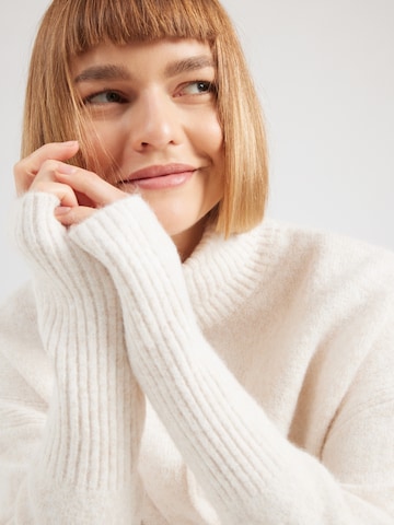 Pullover 'Polly' di ABOUT YOU in beige