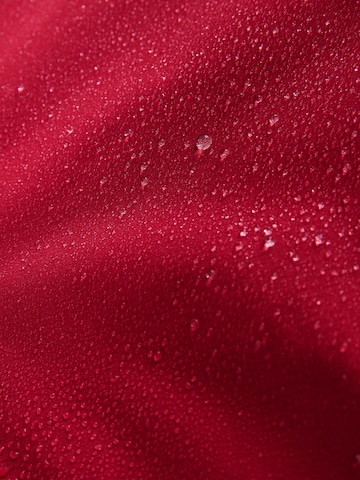 Next Pitkä takki värissä punainen