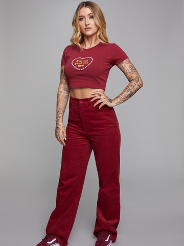 Flared Pantaloni 'Mona' di ABOUT YOU x Sharlota in rosso