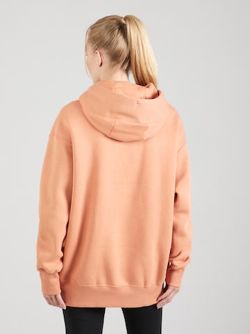 Nike SportswearSweater majica 'Phoenix Fleece' - narančasta boja