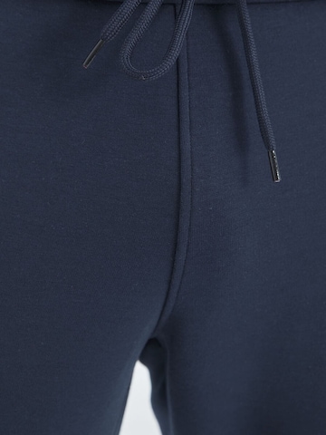Tommy Liferegular Sportske hlače 'Jogginghose' - plava boja
