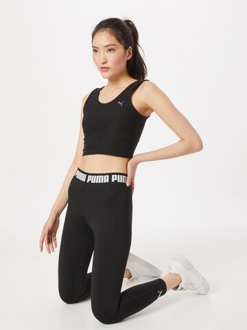 Skinny Pantaloni sport de la PUMA pe negru