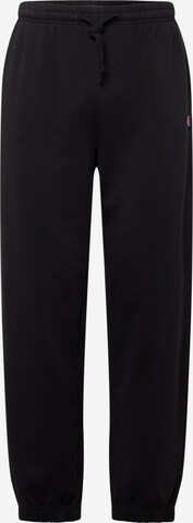 Tommy Jeans Tapered Trousers in Black: front