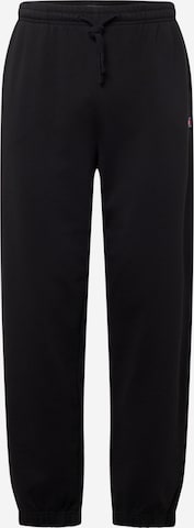 Tommy Jeans Tapered Trousers in Black: front