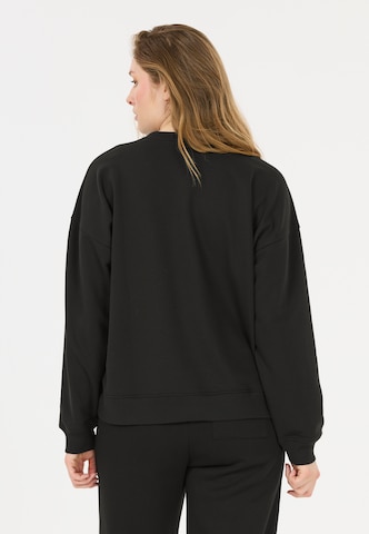 NOU Sweatshirt 'Vacay' in Schwarz