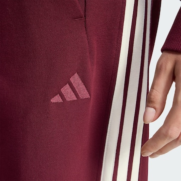 ADIDAS SPORTSWEAR Loosefit Urheiluhousut värissä punainen