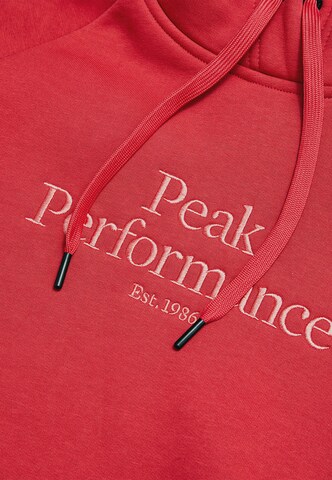 PEAK PERFORMANCE Sweatshirt in Rood