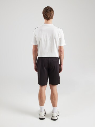 Loosefit Pantaloni di ARMANI EXCHANGE in nero