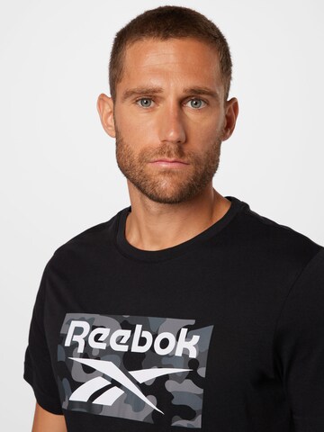 T-Shirt fonctionnel Reebok en noir