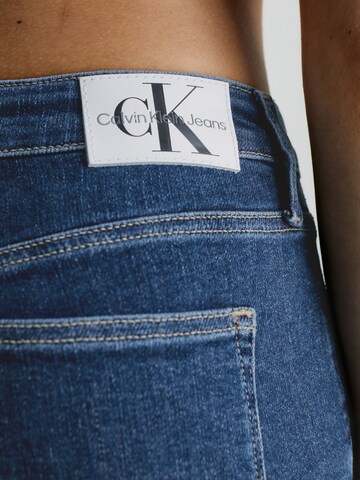 mėlyna Calvin Klein Jeans Prigludęs Džinsai