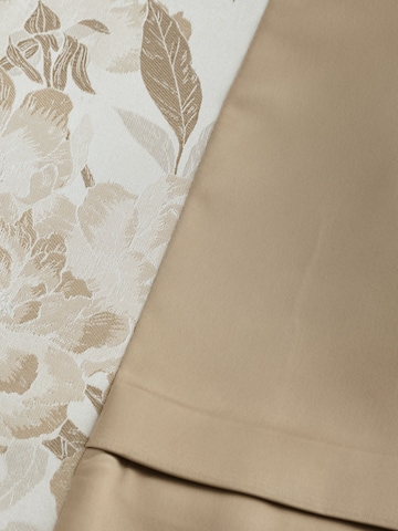 Vestă de la Next pe bej