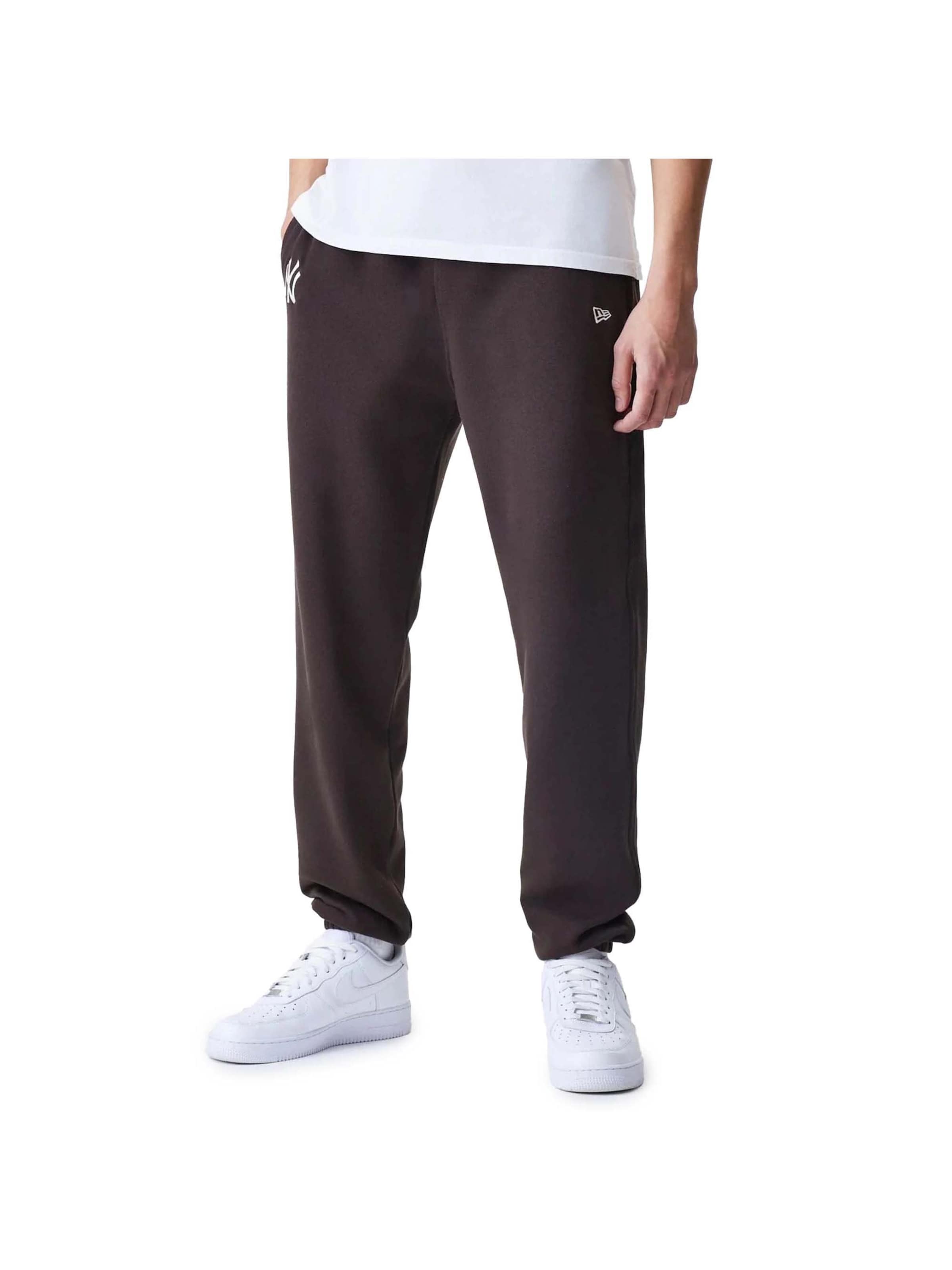 NEW ERA Regular Pants in Brown: front