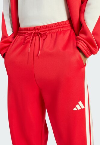 ADIDAS SPORTSWEAR Tapered Trousers in Red
