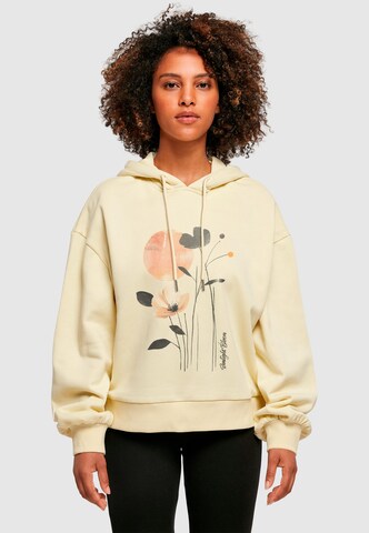 Merchcode Sweatshirt 'Sunlight Bloom' in Geel: voorkant