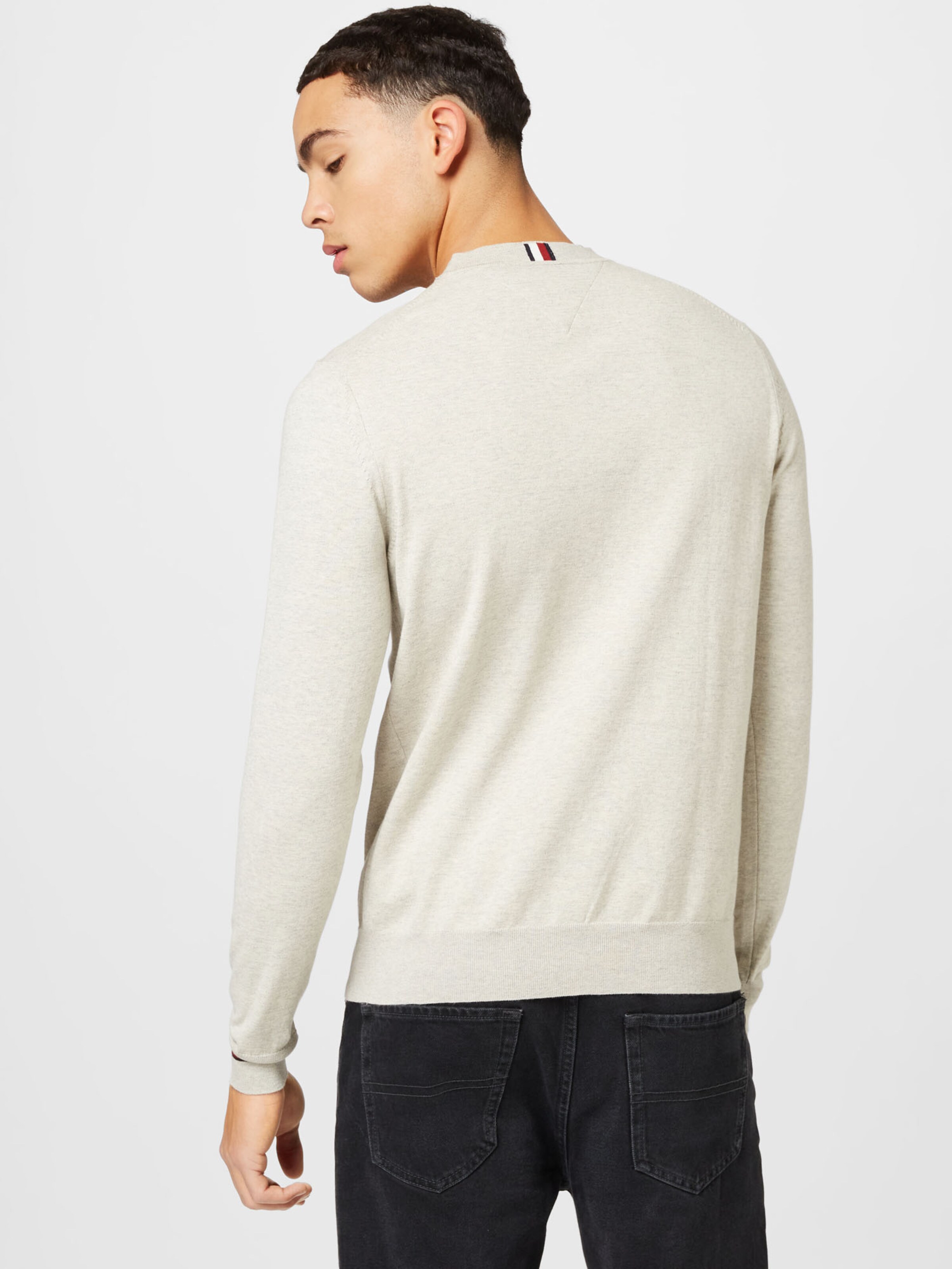 TOMMY HILFIGER Sweater in Cream ABOUT YOU