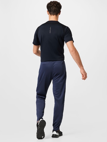 Tapered Pantaloni sport 'Legacy Poly' de la Hummel pe albastru