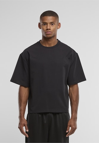 Karl Kani Shirt 'Essential' in Zwart: voorkant