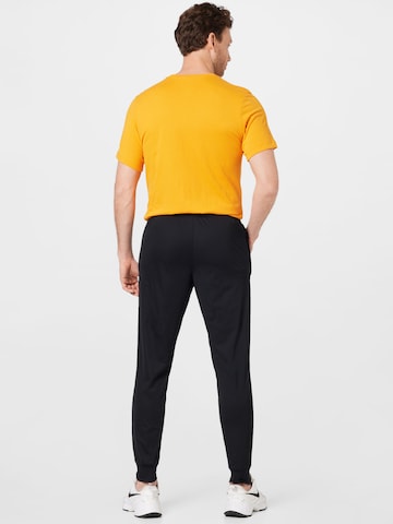 NIKE Tapered Workout Pants 'FC Libero' in Black
