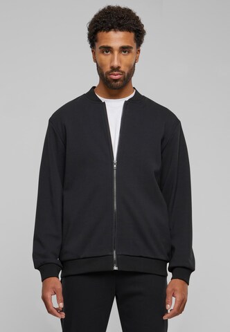 Urban Classics Zip-Up Hoodie in Black: front