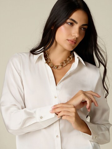 Camicia da donna di oltre in bianco