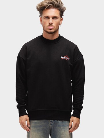Richesse Sweatshirt 'UNEXPECTED CREWNECK' in Zwart: voorkant