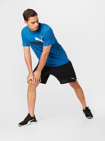 PUMA Regular Sportshorts 'TRAIN ALL DAY' in Schwarz