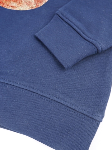 MelaDi Pullover 'Meladi Kinder Baby-Sweater aus Biobaumwolle - Apfel auf Navy Blue'‌‌‌‌‌ in Blau
