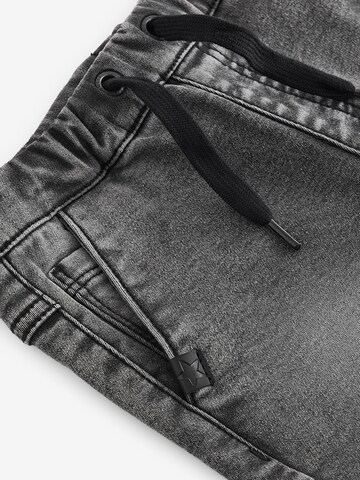 Slimfit Jeans di Next in grigio