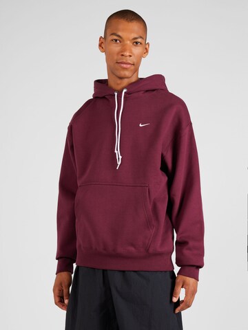 Sweat-shirt Nike Sportswear en rouge : devant