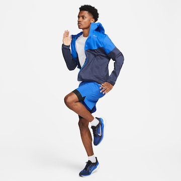 Veste de sport 'Windrunner' NIKE en bleu