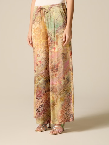 oltre Baggy Pants in Beige: front
