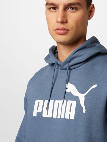 PUMA - Sweatshirt de desporto 'Essential' em azul
