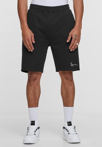 Karl Kani Regular Trousers in Black: front
