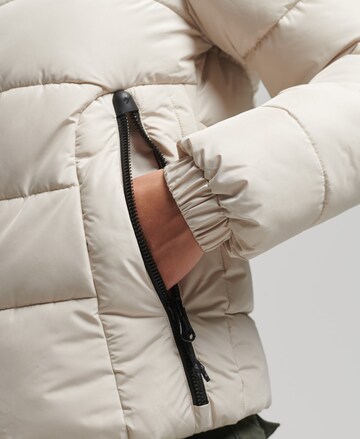 Superdry Zimní bunda – béžová