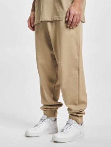 DEF Tapered Trousers in Beige: front