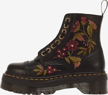 juoda Dr. Martens Suvarstomieji kulkšnis dengiantys batai 'Sinclair': priekis