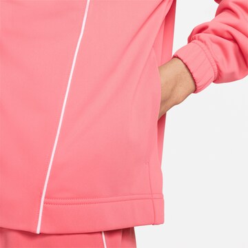 Nike Sportswear Trainingspak 'Essential' in Roze